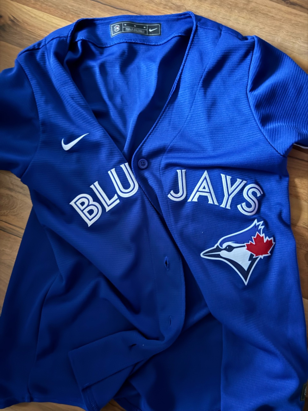 Blue Jay Royal Blue Team Button-Up Jersey with White Script and Red Maple Logo